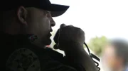 Chris Gurule checks if a man has warrants.