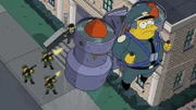 Ein Fehler bei der Post lässt Wiggum ein Jetpack zukommen. Doch seine Aktivität als Himmelspolizist nimmt ein jähes Ende ...