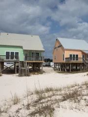 As seen on HGTV's Battle on the Beach, teams will compete to renovate the interior and exterior of these three outdated and rundown beach houses in Gulf Shores, Alabama. (Before)