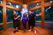 Sherri Shepherd with Wayde and Brett in front of her new tank.