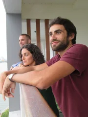 Portrait shot of agent Peter Frieske with contributors Casie Tennin and Casey Laird in Da Nang, Vietnam as seen on their house tour for House Hunters International.
