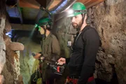 Elizabeth Saint and Nick Groff in the caves underneath Adam Stephens house.
