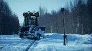 Schneeräumung mit einem Schneepflug.
