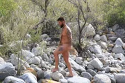 Chris walking on the stones