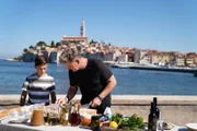 Croatia - Gordon Ramsay (R) with Croatian chef David Skoko's son, Anton, at the final cook.