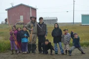 Nunivak Island, Alaska, USA: Austin Manelick posing with villagers.