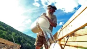 HANCOCK, N.Y.- Ray pouring a bucket of water through his "flush'o'matic" in order to flush eels into the live-box.
