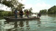 MORGANZA, LA.- Keith, David, and Seth watch to see if they have an alligator at the end of the line.