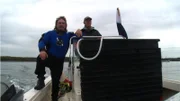 BATH, MAINE- Jim and his tender headed out to sea in order to harvest sea urchins. (Photo Credit: National Geographic Channels/Gary Bain)