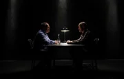 Actor Detlef Bothe (R) and criminal investigator and profiler Stephan Harbort pose on set during the shooting for the new local production 'Protokolle des Boesen' by German TV channel A&E.