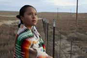 DeAmdra Barber as Navajo "First Woman" listens for crying baby in reenactment of the first Kinaalda.