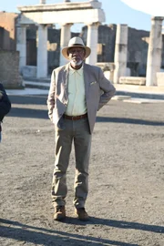 Morgan Freeman poses for a photo amid the ruins of Pompeii.