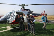 Frank and crew outside helicopter in Langtang.