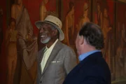 Morgan Freeman and Andrew Wallace study the artwork at the villa of mysteries.