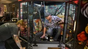Chris and Tyrone working together to assemble the bench seating section to the Tattoo build.