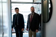L-R: Jeff Wilbusch as Avraham Avraham, Michael Mosley as Detective Earl Malzone.