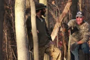 Willy and Wild Bill chatting before Willy goes up the tree.