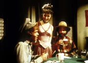 Johnny (Mitch Vogel, l.) hat eine Glückssträhne. Mimi (Jane Alice Brandon, M.) und Mr. Edwards (Victor French, r.) freuen sich mit ihm.
