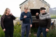 Iceland - Birna (L) and Finboggi (R) introduce Gordon Ramsay (center) to fermented shark and brenevin or "burning wine" in Iceland.