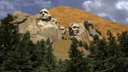 Mount Rushmore covered in grain.
