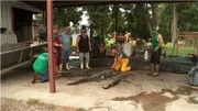 MORGANZA, LA.- At LeBlanc's Processing the boy watch as their gators are measured to see how much they are worth. (Photo Credit: National Geographic Channels/Autumn Montgomery)