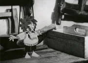 Da es im Winter in der Werkstatt ziemlich kalt ist, beschließt der Meister Eder, dass der Pumuckl einen Pullover bekommen muss.