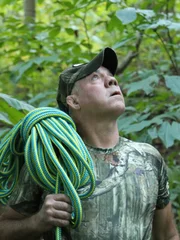 Bill looking up into the trees.