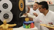Buddy and Joe working on the cake.