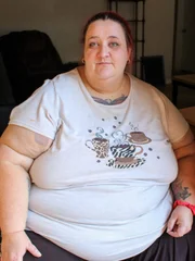 Angie sits in wheelchair