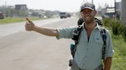 Rob Greenfirld hitching a ride in Brazil with Jams Levelle.