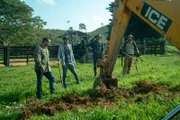 Jerry, Ramon, Colin, and Max watch the excavator dig.