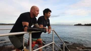 Dr. Johan Gustafson und N. Paul De Gelder blicken auf den Gold Coast SeaWay.