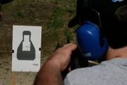 Sig Sauer Academy instructor firing weapon.