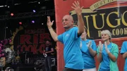Anthony heads to the stage to participate in a professional rib eating competition, as seen on Travel Channel's Hotel Impossible.