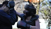 Brian Sugrim forces wife Bernadette to engage in hand to hand combat.