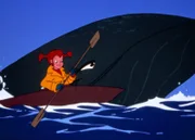 Pippi ist von Bord der "Hoppetosse" in ein Kanu gestiegen, um den grünen Walen den richtigen Weg zu weisen.