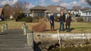 Real estate agent Sarah Marchese shows homebuyers Josh and Jamie the large backyard and private dock at the Chesapeake Bay House, as seen on HGTV's Beach Hunters.