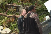 Noah Brown (l.) at the junk yard talking to Jeremiah.