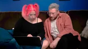 Matt and Shelby look at a computer screen in SOSA office
