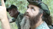 Willy pointing something to Wild Bill.