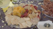 In this episode of Food Network's Giada Entertains, Giada De Laurentiis hosts a cocktail party and good old-fashioned talent show with her friends in the style of a creative salon. Guests bring their best creative hidden talents, whether it's singing, playing the guitar, magic or juggling. The menu includes Candied Prosciutto, Roasted Carrot Hummus, Crab Crostini with Lemon and Herbs and Calabrian Mojitos.