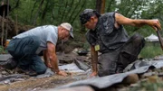 L-R: Dave Turin and pirate Mike Penwell hunt for gold in South Dakota.