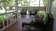 View of the back Patio, shown to clients Eric and Cheryl Jones, in Kauai, Hawaii, as seen on HGTV's Hawaii Life.