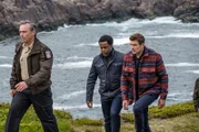 L-R: Superintendent Wes Walker (SHAUN SMYTH) leads Donovan (KEVIN HANCHARD) and Charlie (JOHN REARDON) to the crime scene