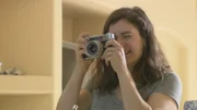 Physicist Sara Walker, Ph.D., University of Arizona, taking a picture at her home, demonstrating the evolutionary drive to gather and decode more and more information.