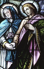 Stained glass image of Mary Magdalene.