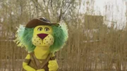 Oli will dem Erdmännchen eine Standpauke verpassen.