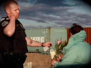 An Alaska cop confiscating alcohol.
