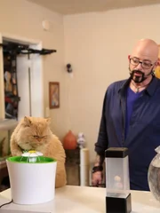 Jackson watching Mr. Weasley drinking water.