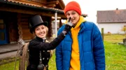 Checker Julian mit Schornsteinfegerin Laura.